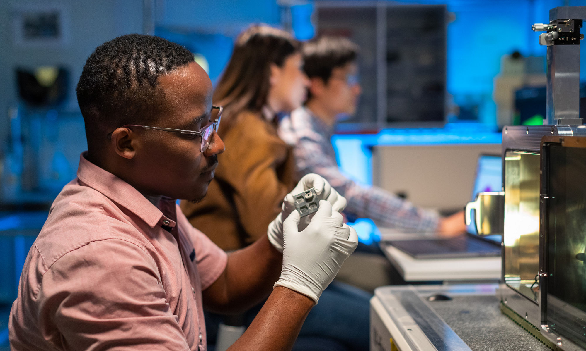 Employee working in surface analysis lab